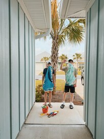 Out front, getting ready for a walk to the beach