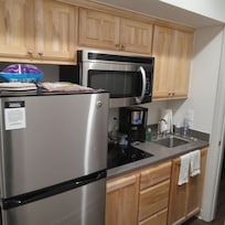 Large fridge, micrwave and stovetop.