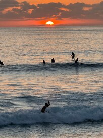 Surfers at Sunset