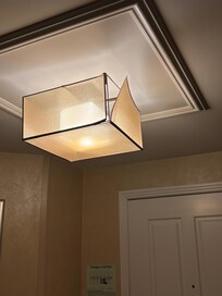 Damaged light at entryway.