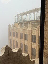 Pictures from a window looking to the one of the two pools.