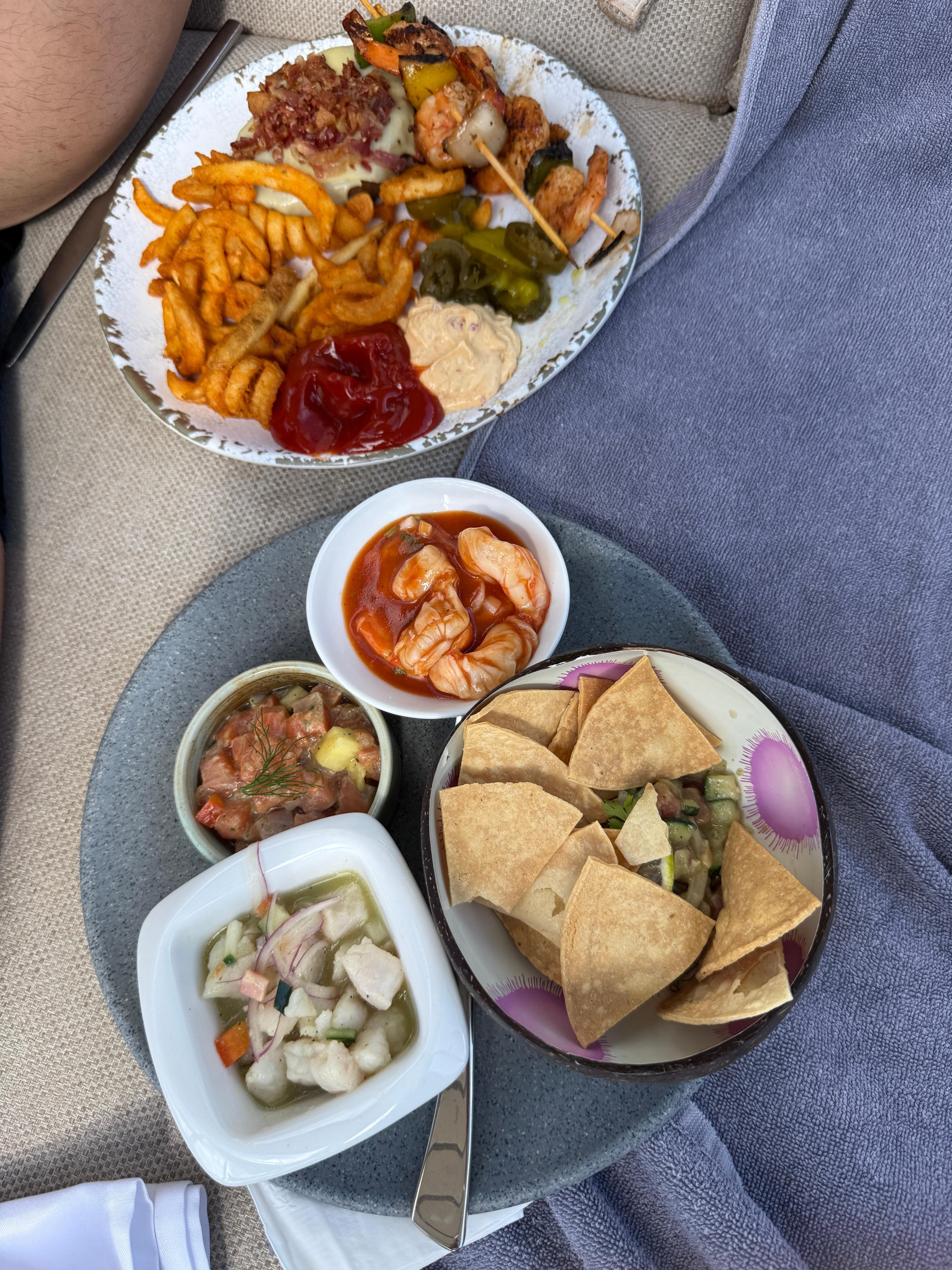 Lunch from the grill and the specialty of the day ceviche bar poolside in the cabana. The flavors were out of this world good!