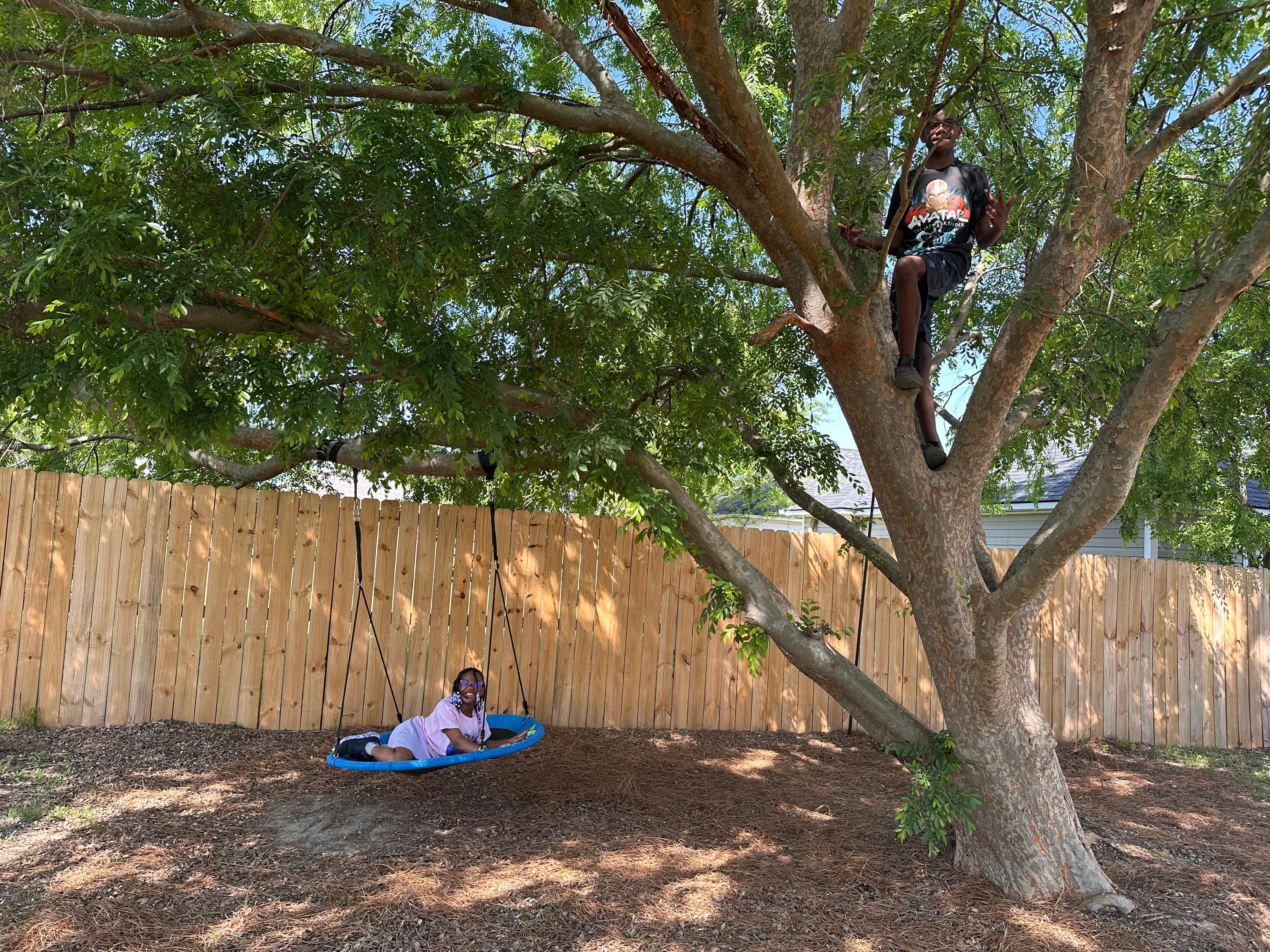 The kids playing in the backyard