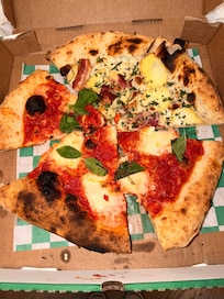 Pizza downstairs from the condo!