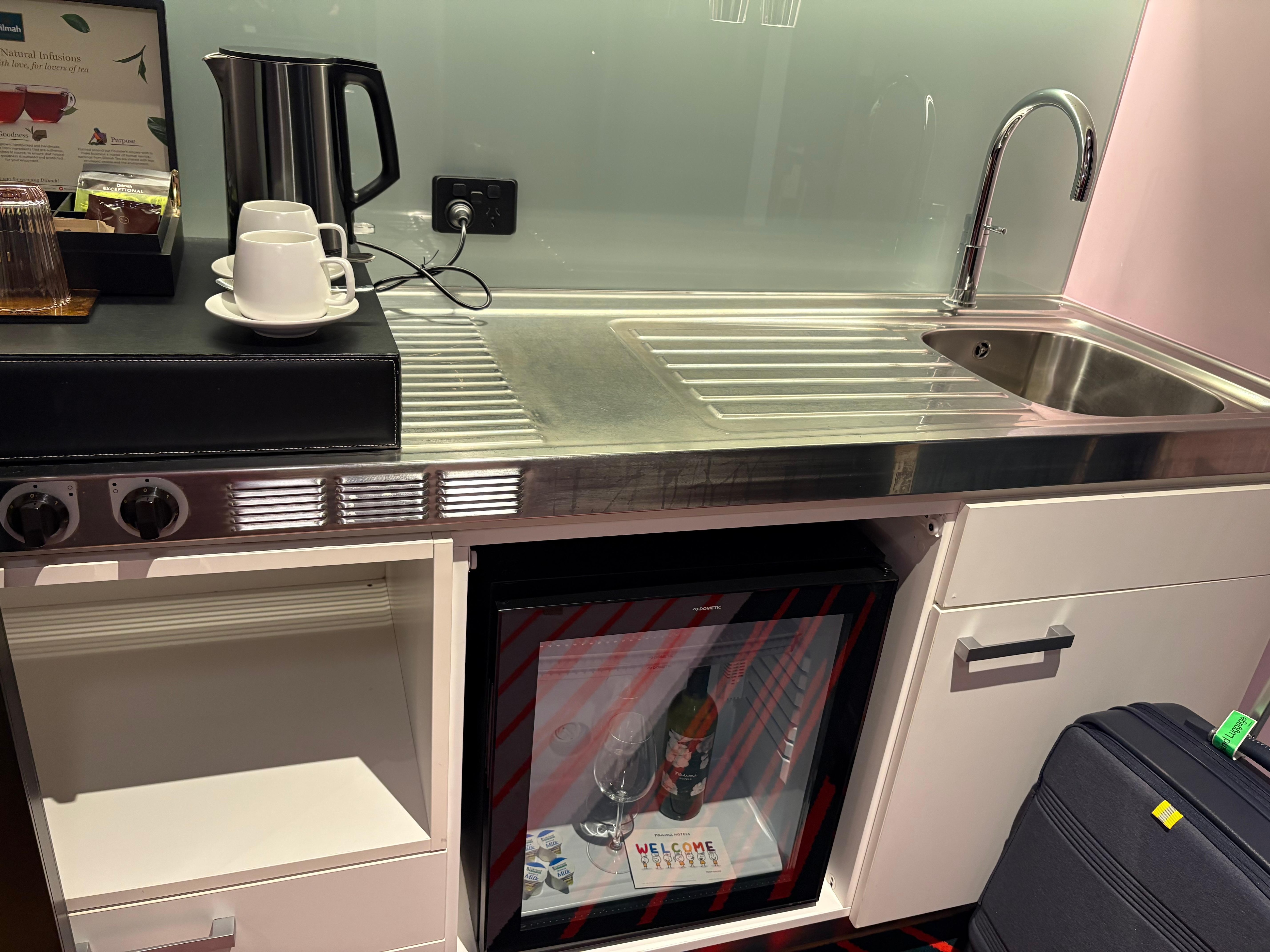 Mini kitchenette in room. Non working hot plate. 