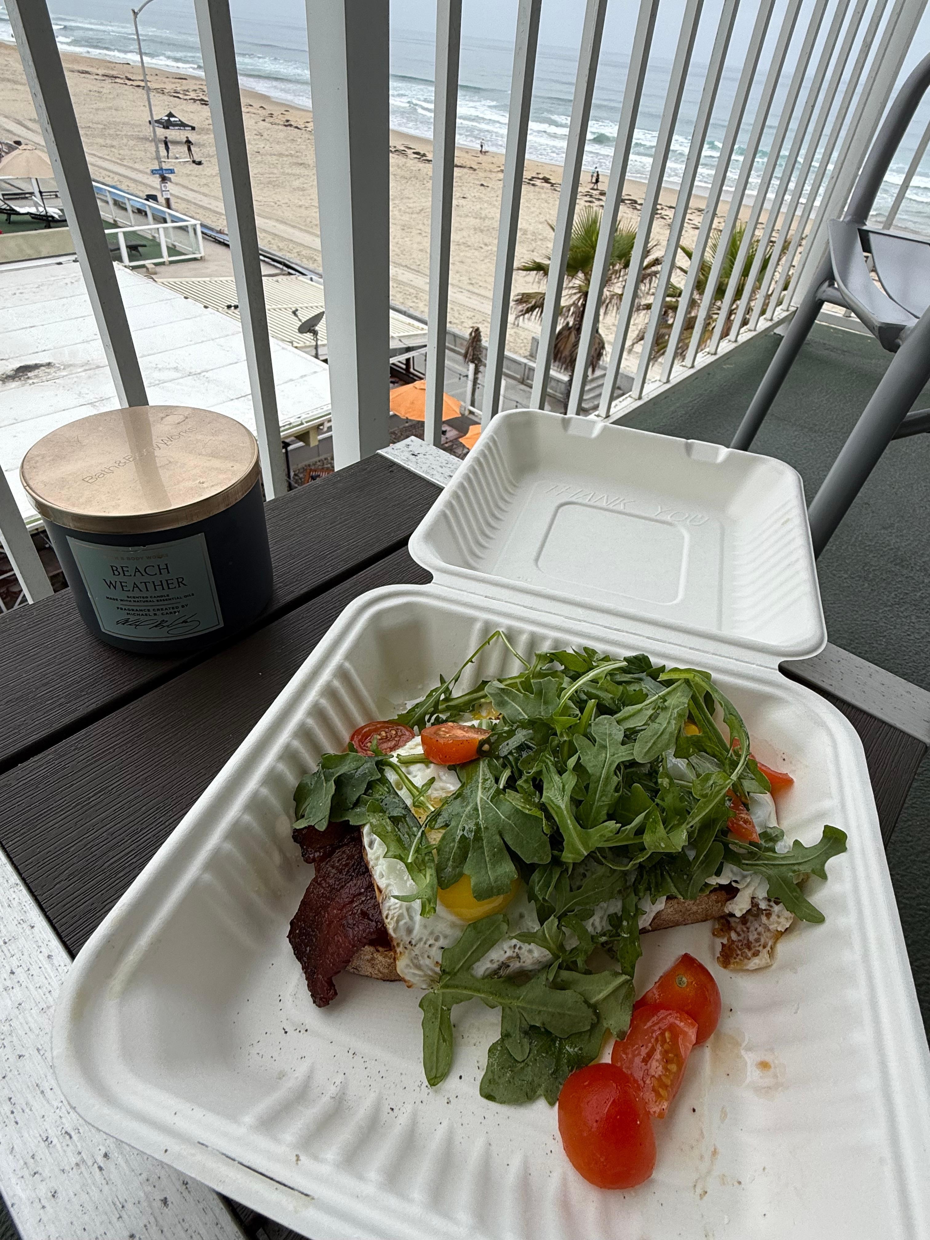 AVO toast from Woodys eating on my ocean view room balcony 