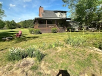Back of cabin near river