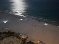 Looking down at the beach from our room