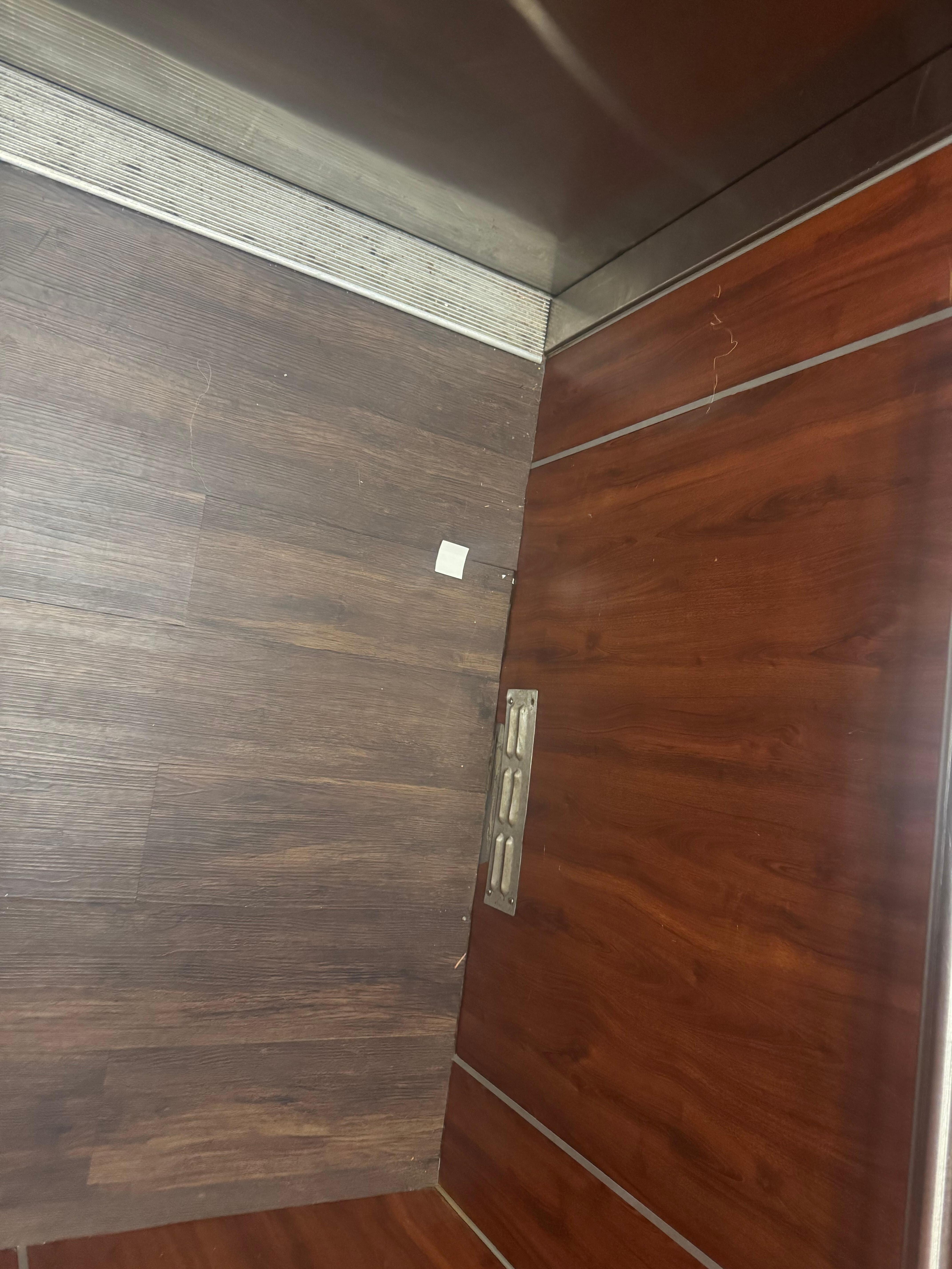 Garbage on elevator floor 