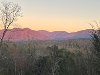 View of mountains from the side of deck.