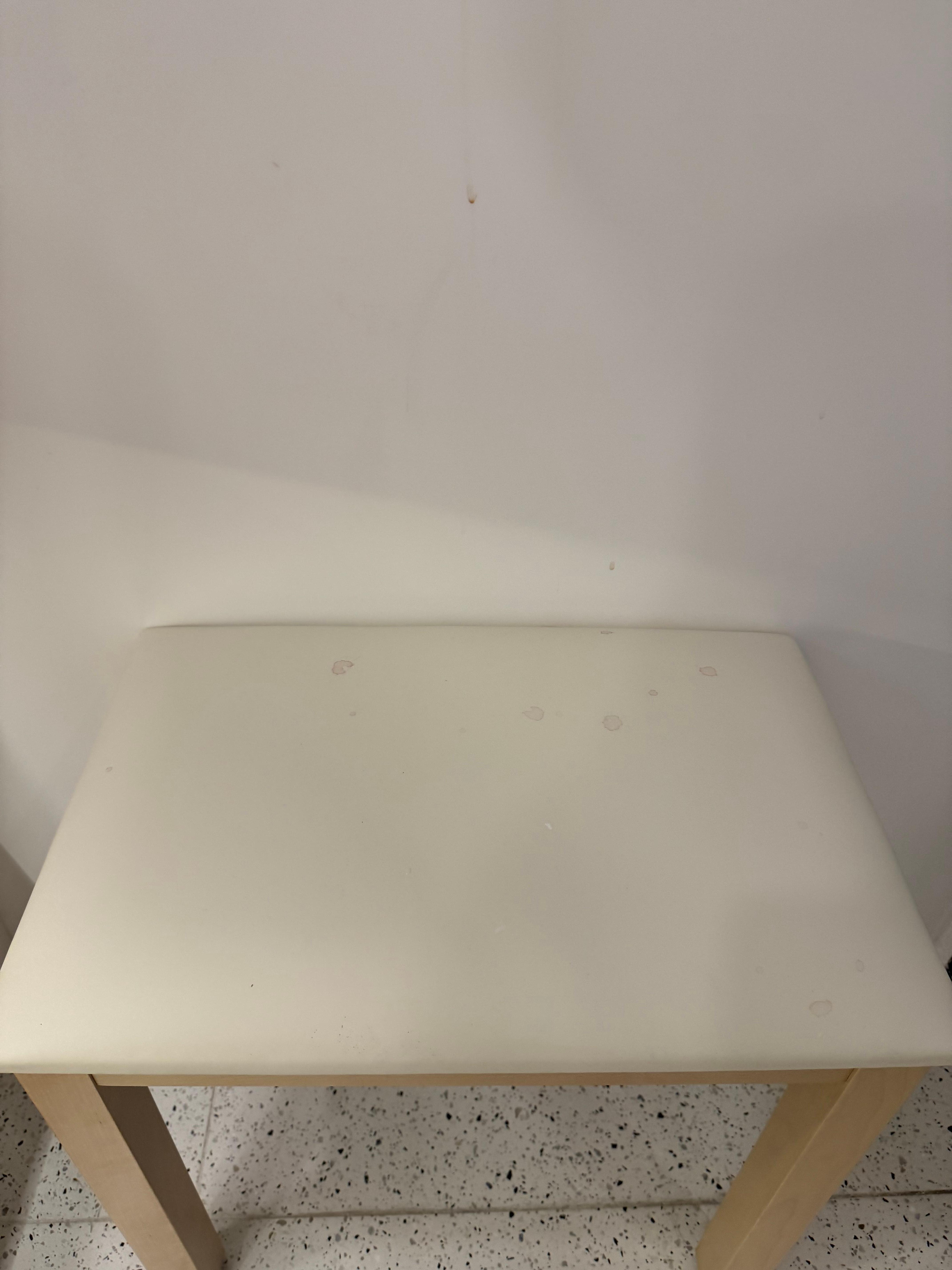 Coffee stain left on chair