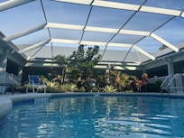 Screened in Pool that was warm, great for swimming in leisurely and free from mosquitoes.
