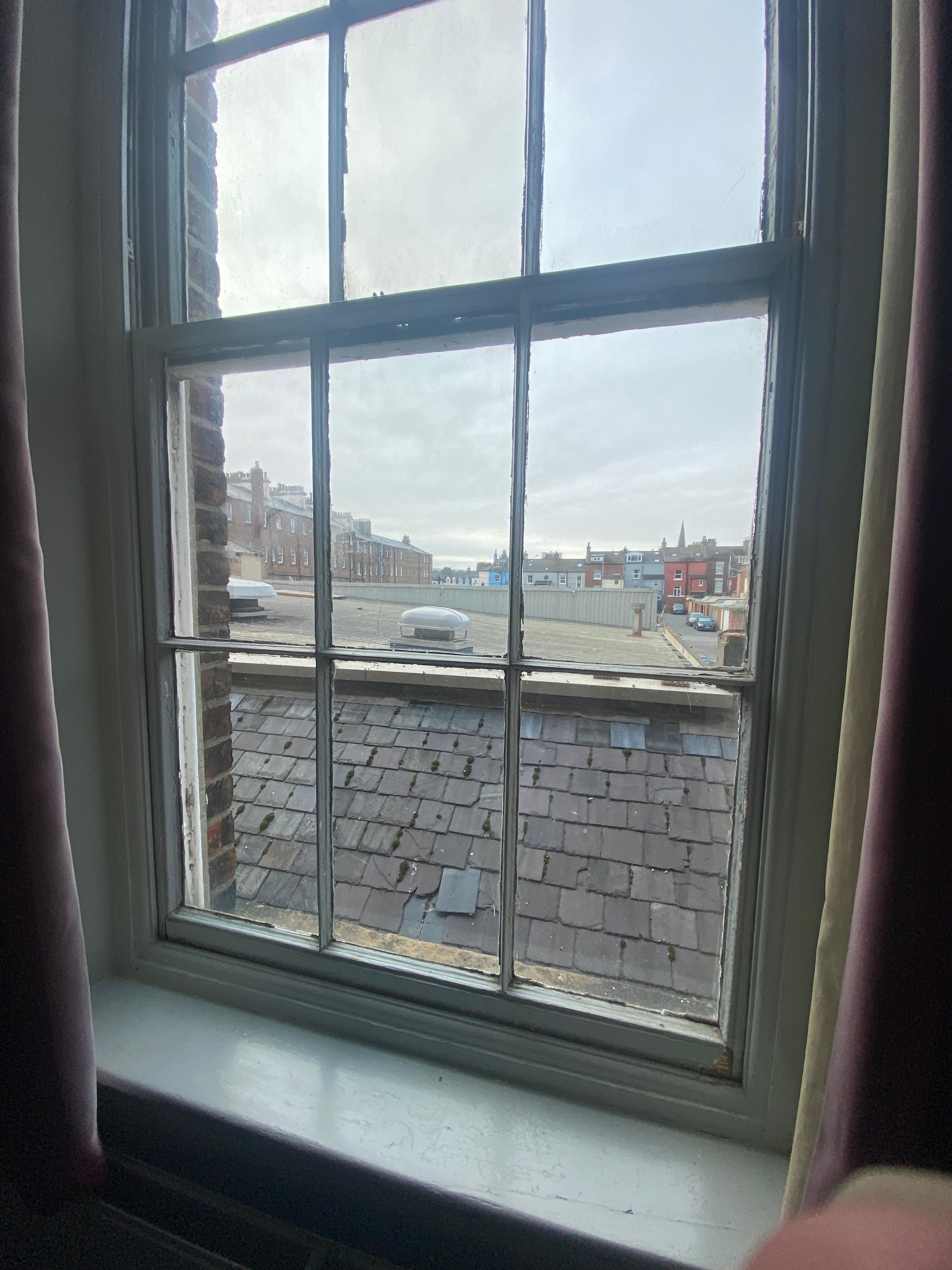 Window frame was rotting and window would not stay open without propping open with something and when it was open, smell from the kitchens below was quite strong.