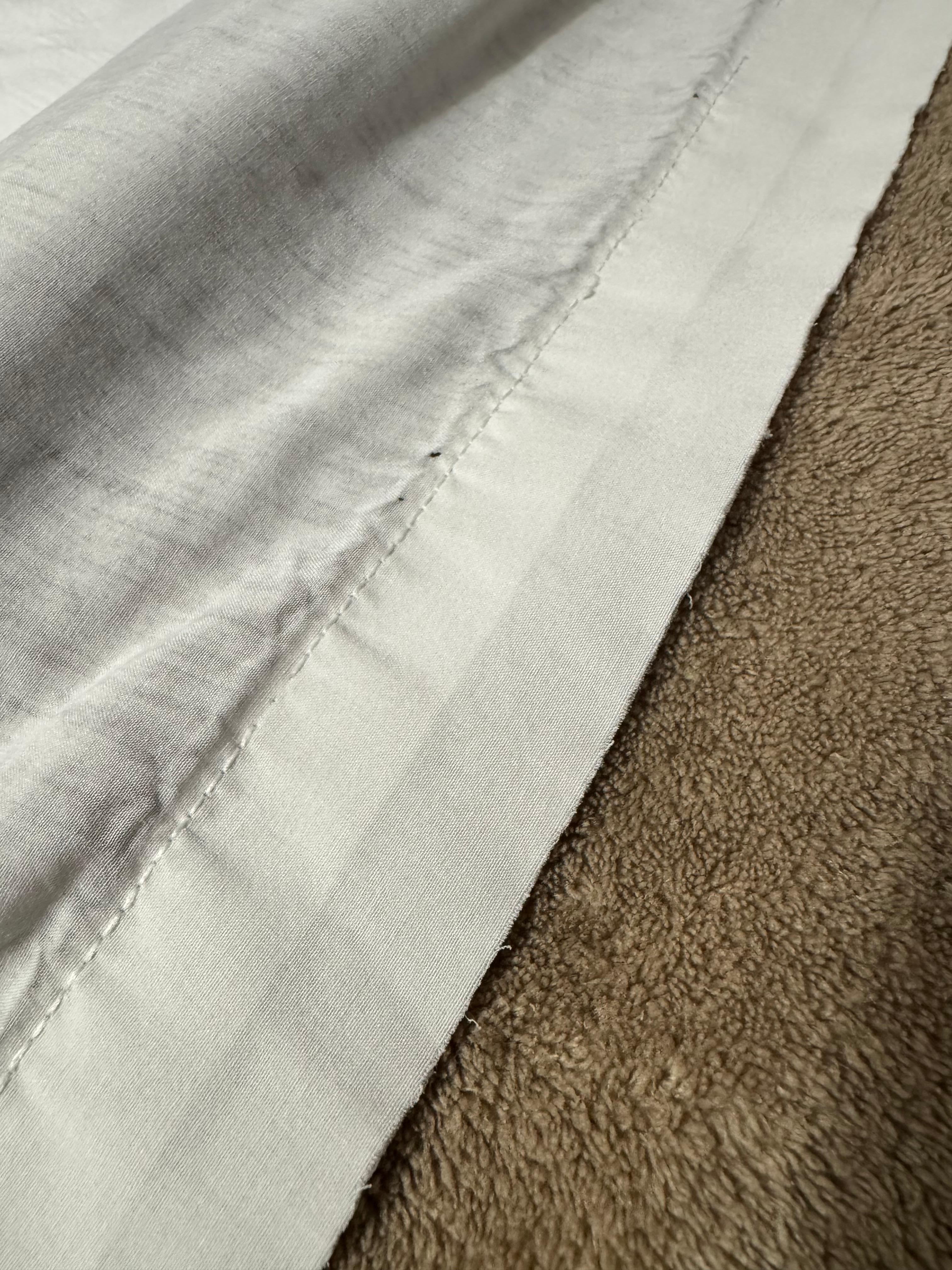 Worn out bed sheet