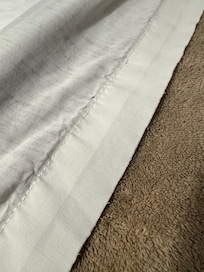 Worn out bed sheet