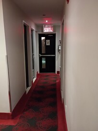 Emergency exits at end of hallway