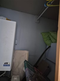 Cupboard in the second bedroom. You would have to climb into the cupboard to hang stuff up.