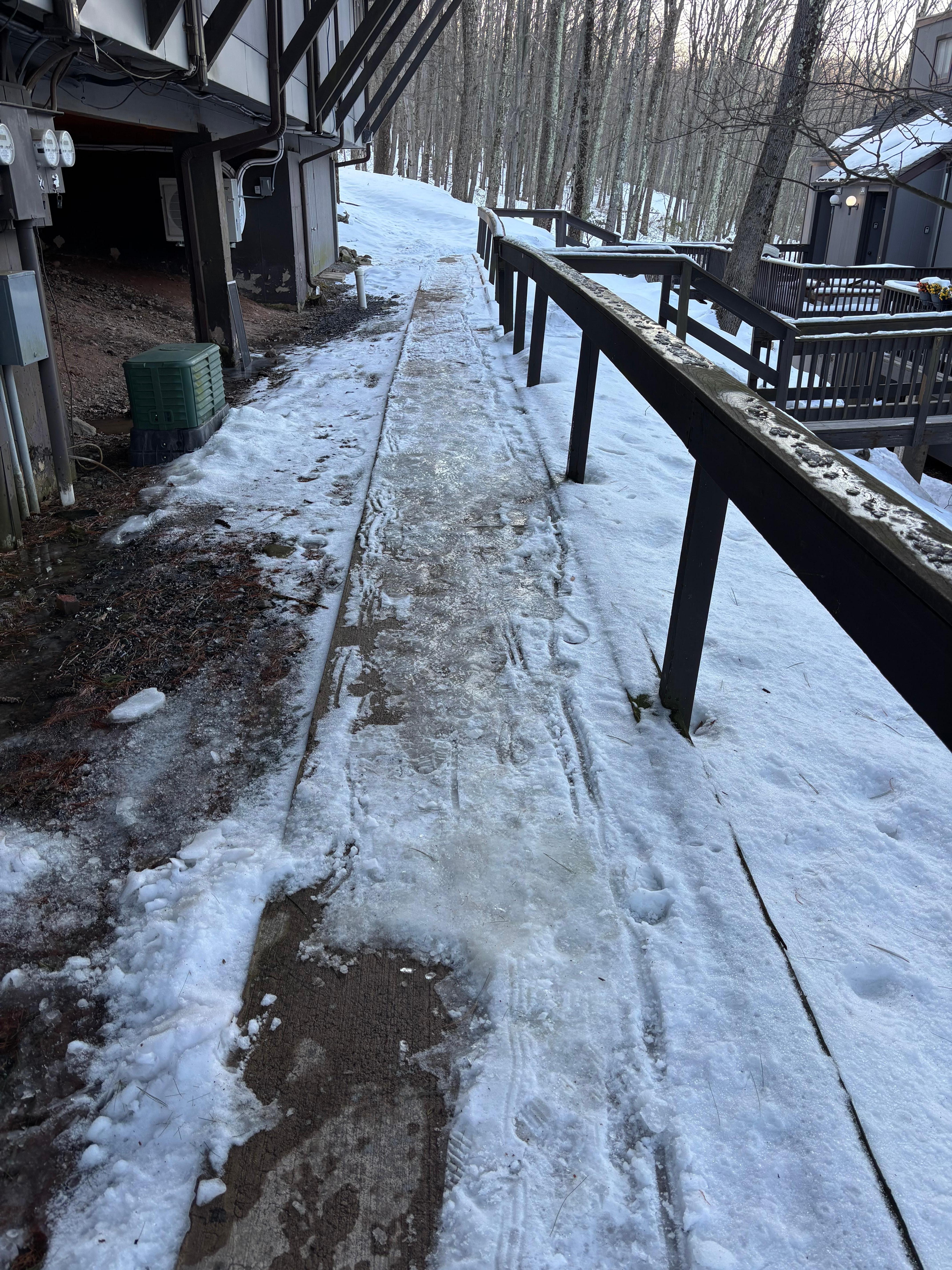 ICE PATH TO UNIT 30 AFTER WALKING DOWN 40 STEPS