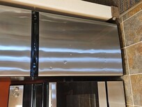 Dented fridge.