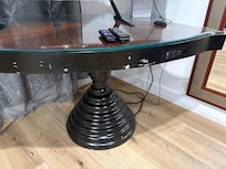 Weird table that was actually pretty dangerous because the glass kept sliding