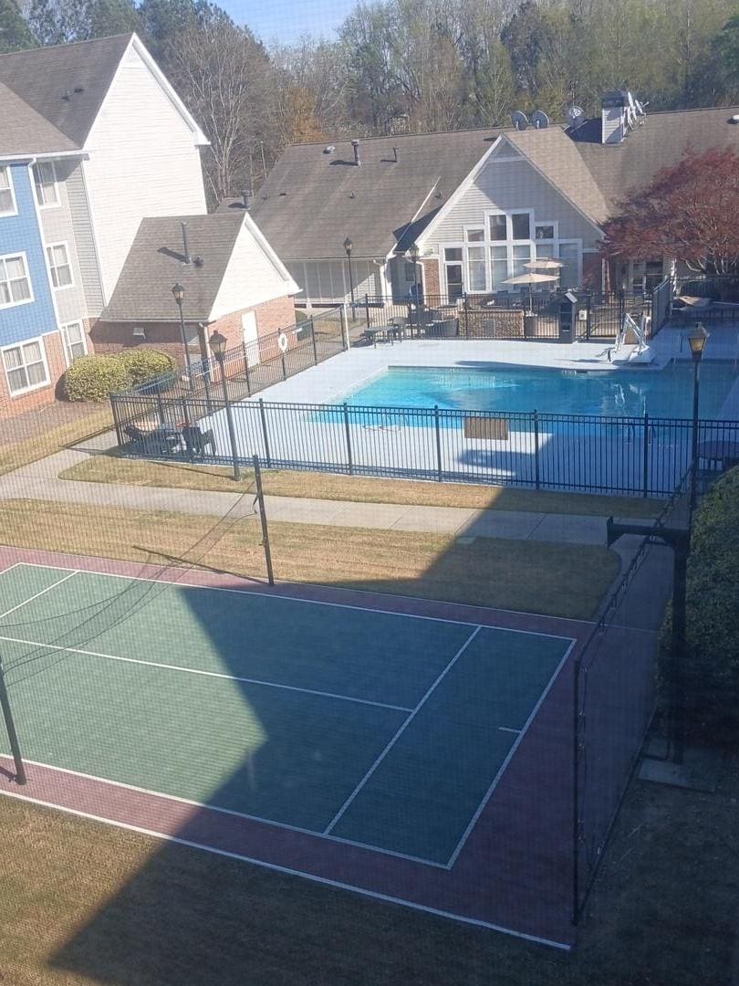 View of pool and basketball court from my 3rd floor suite