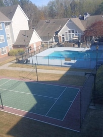 View of pool and basketball court from my 3rd floor suite