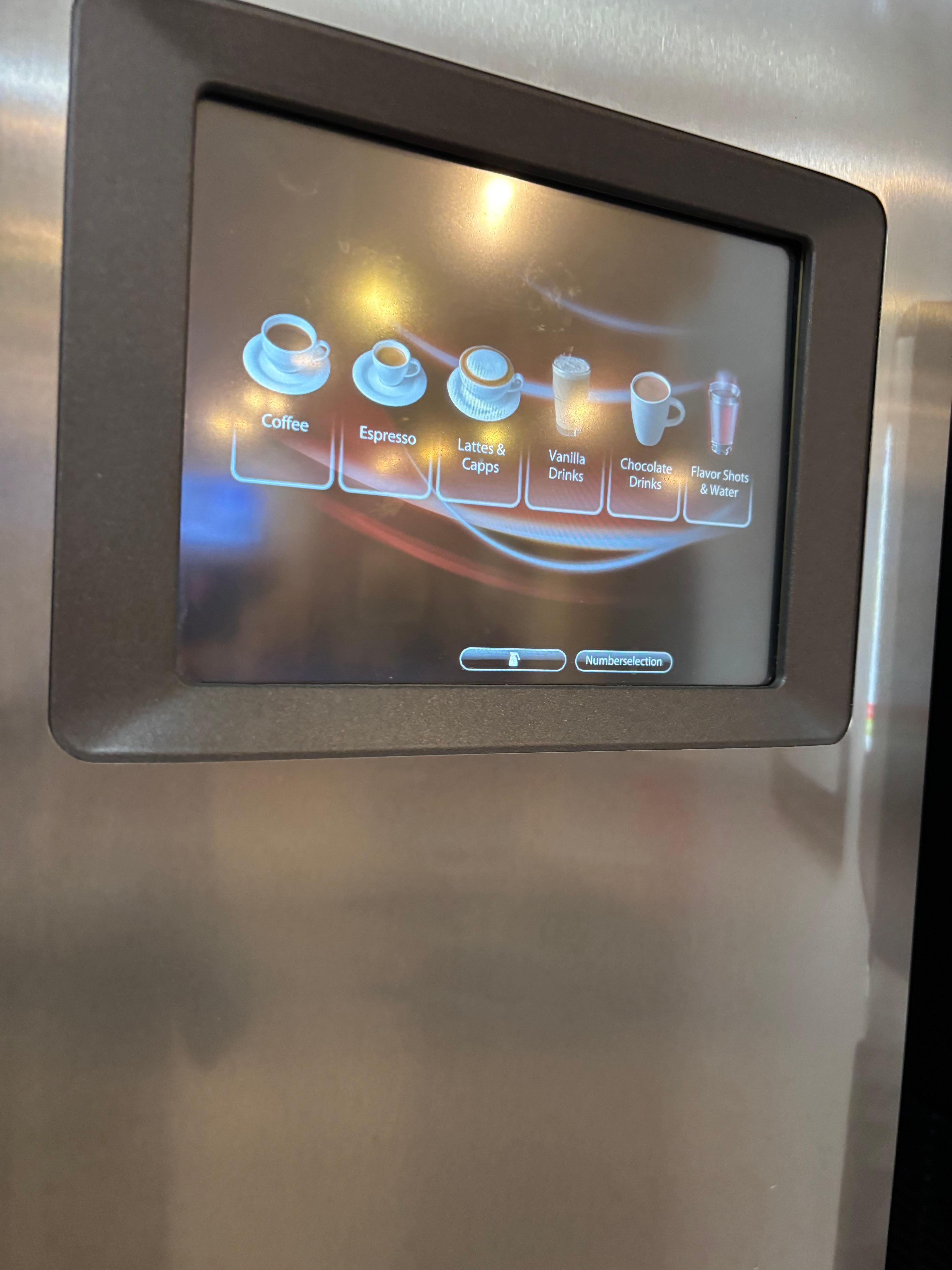 What a fancy coffee machine! I chose a cappuccino.