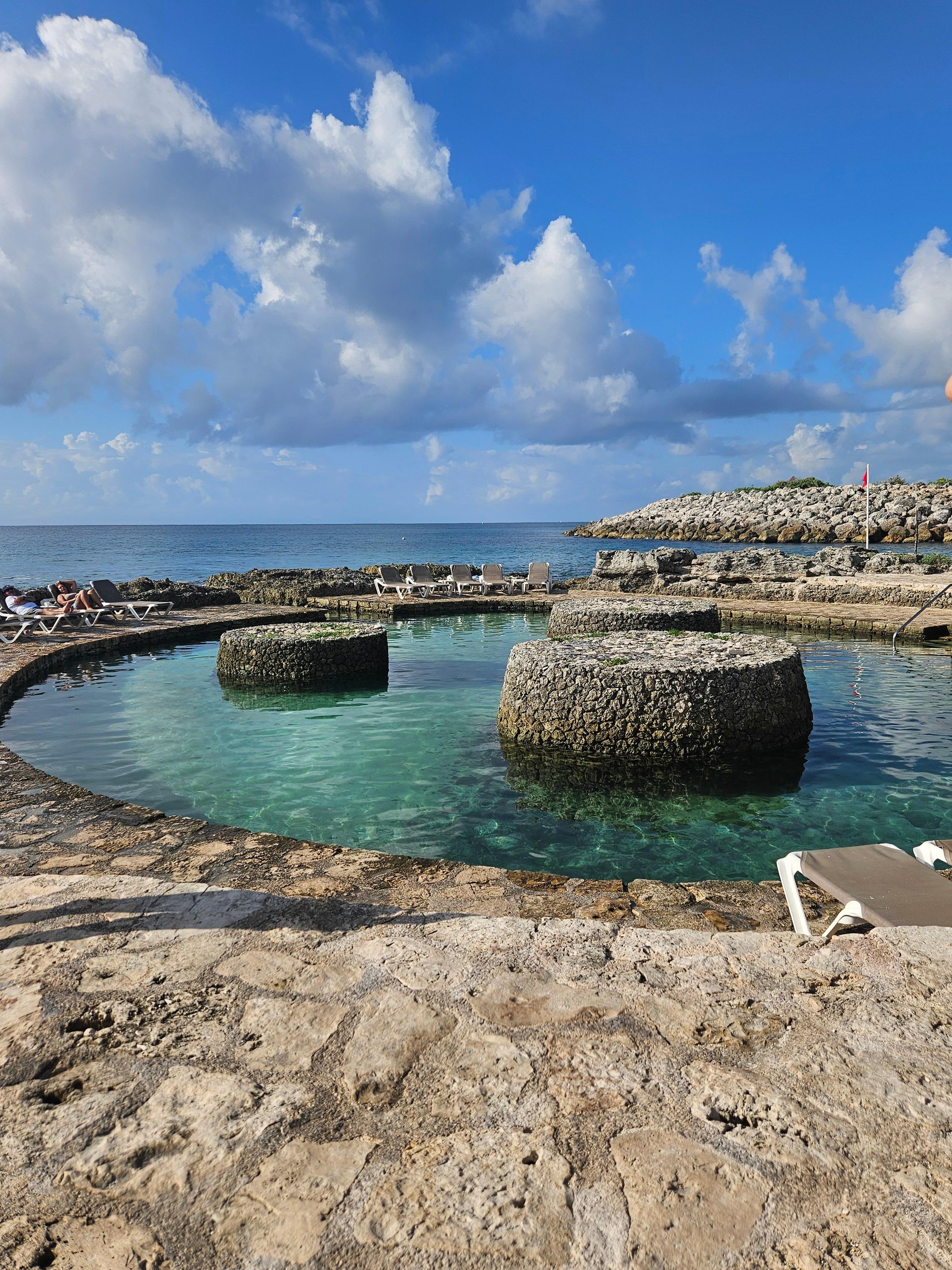 Access to the beach with plenty of lounging, and a lagoon for kids.