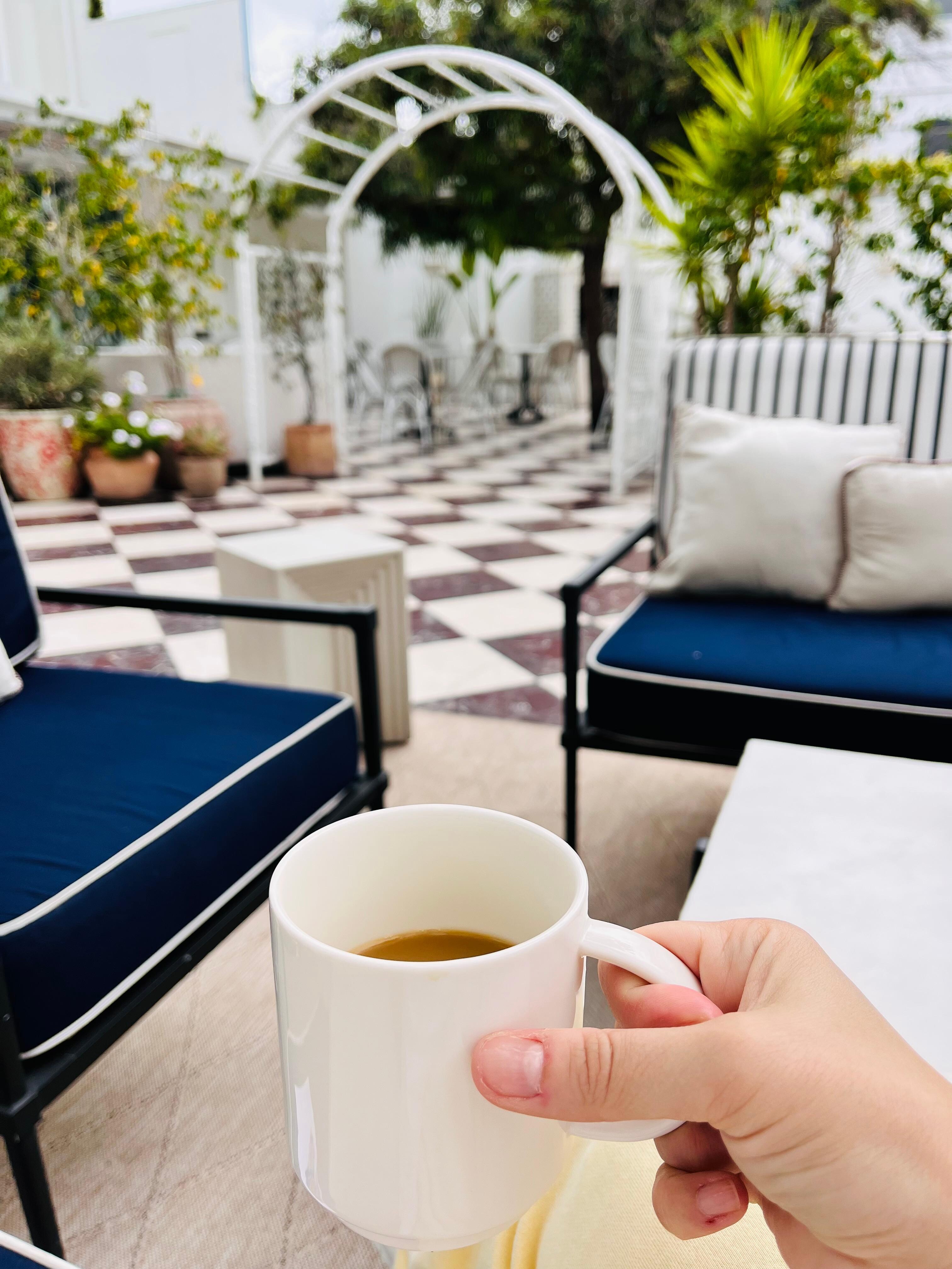 Quiet courtyard is a peaceful place to enjoy the free coffee in the morning!