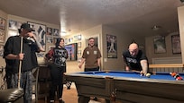 Playing pool.