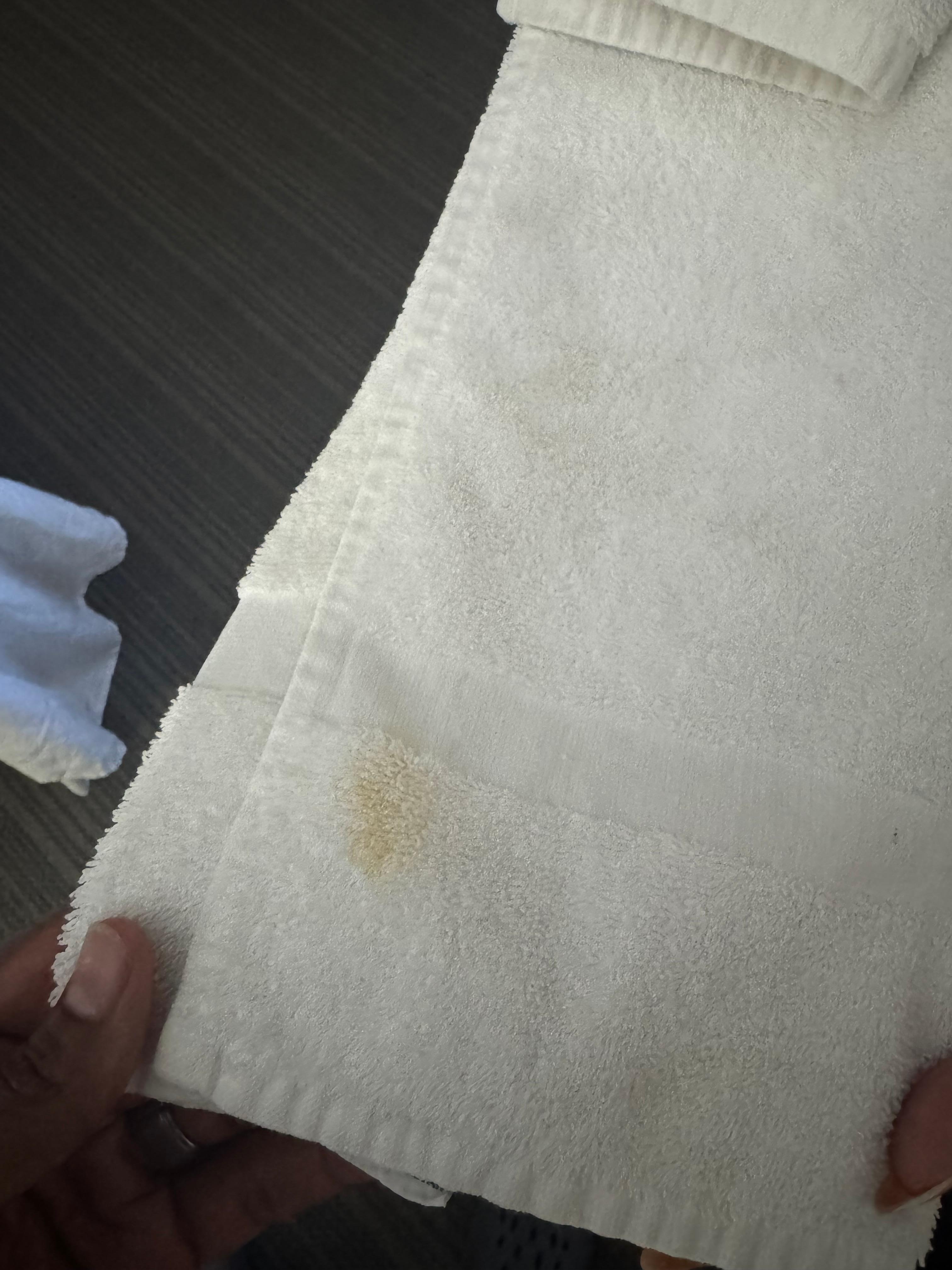 "Fresh" towels with stains on them