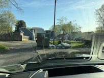 Trash dumpster at the stairs