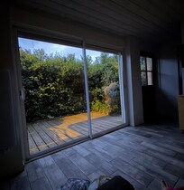 The large patio doors allow for some much natural light, but has an amazing shutter for great sleeping.