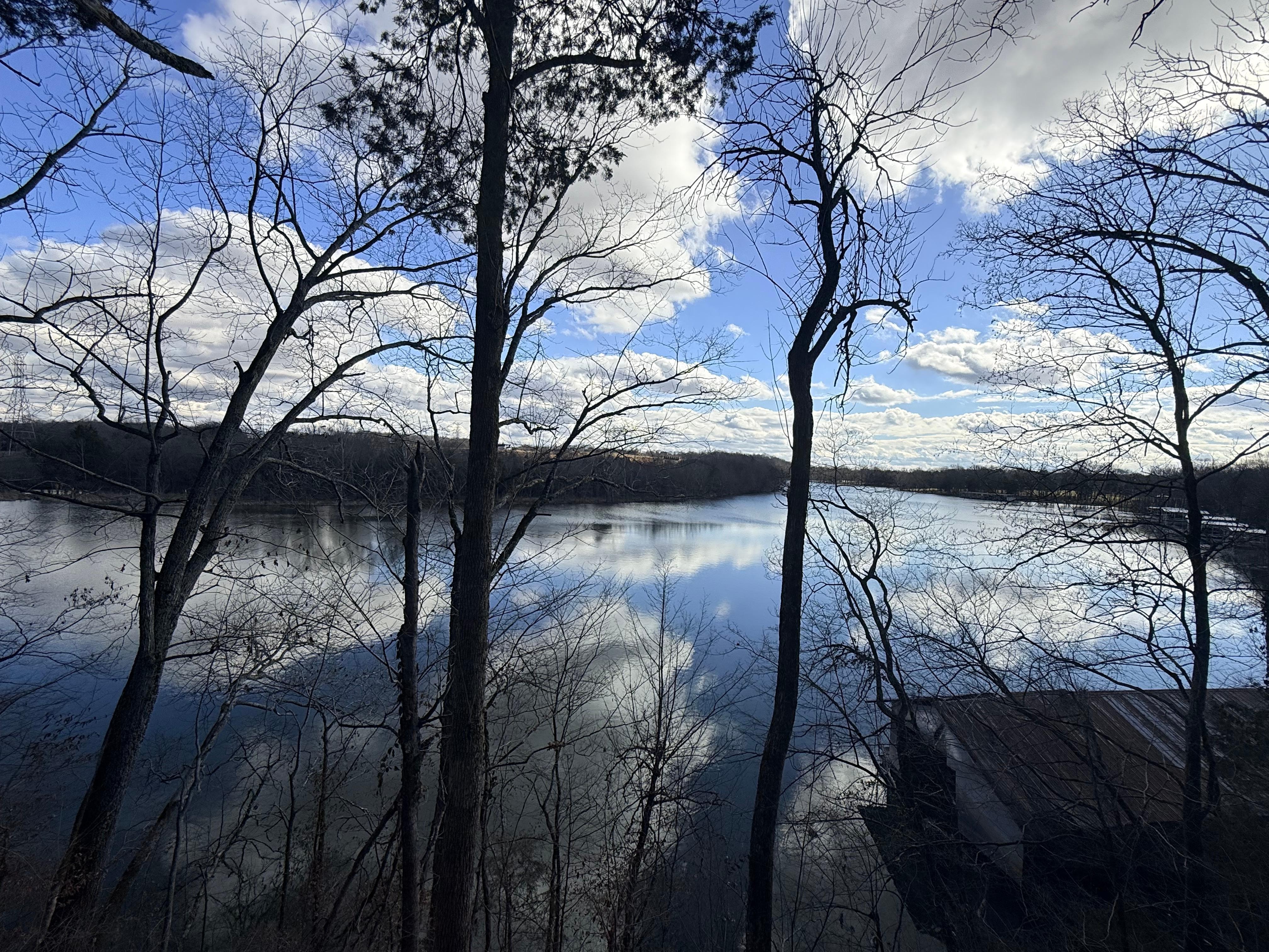 Sitting on the cliff on the lake 