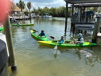 Launching kayaks at Island club