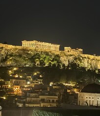 View of the Parthenon from the rooftop bar at night