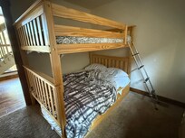 Bunk room really only fits 3 comfortably, mice in room next door to this room. No AC in these lower rooms, only fans
