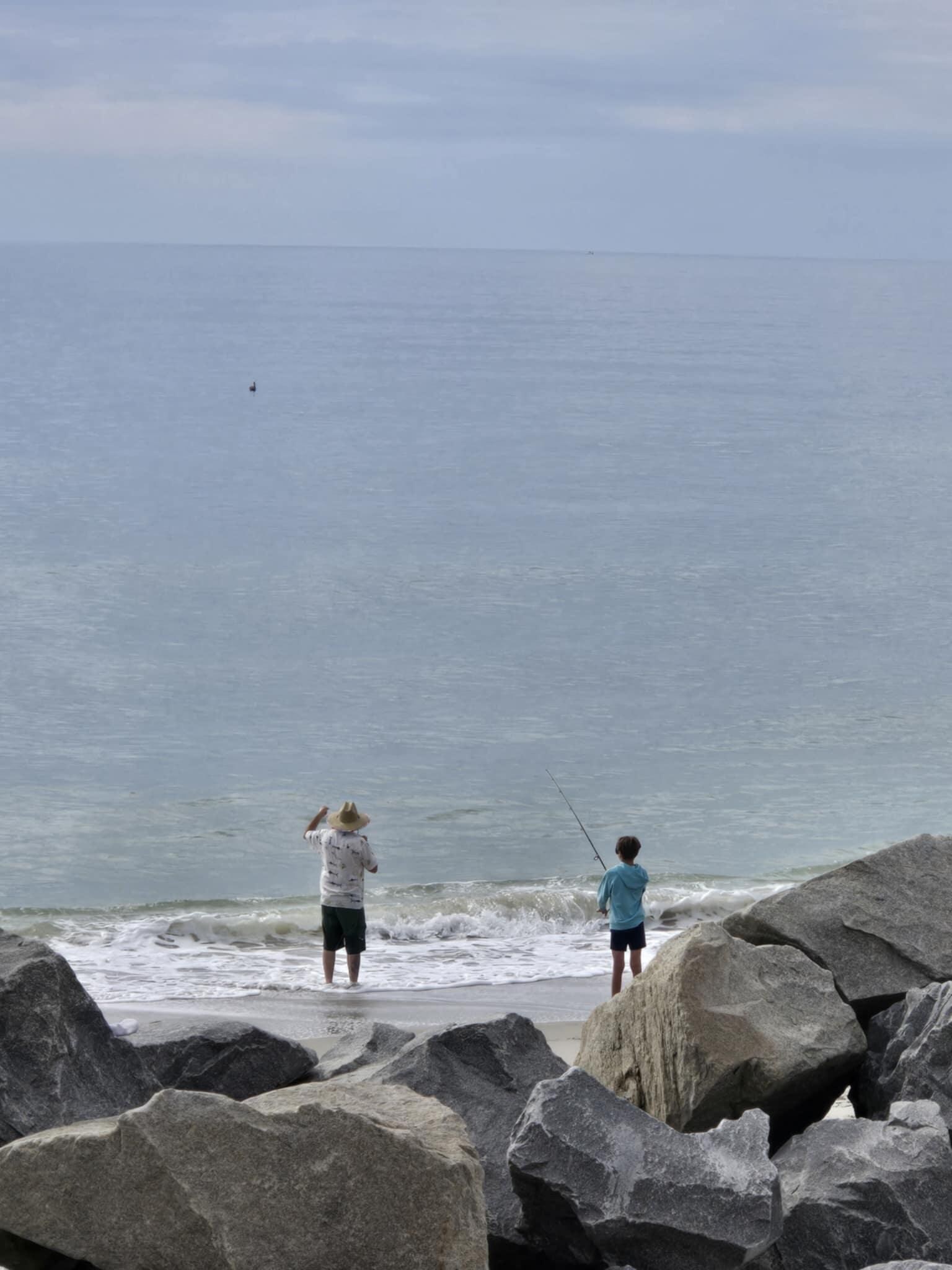 watching my husband and son fish from balcony
