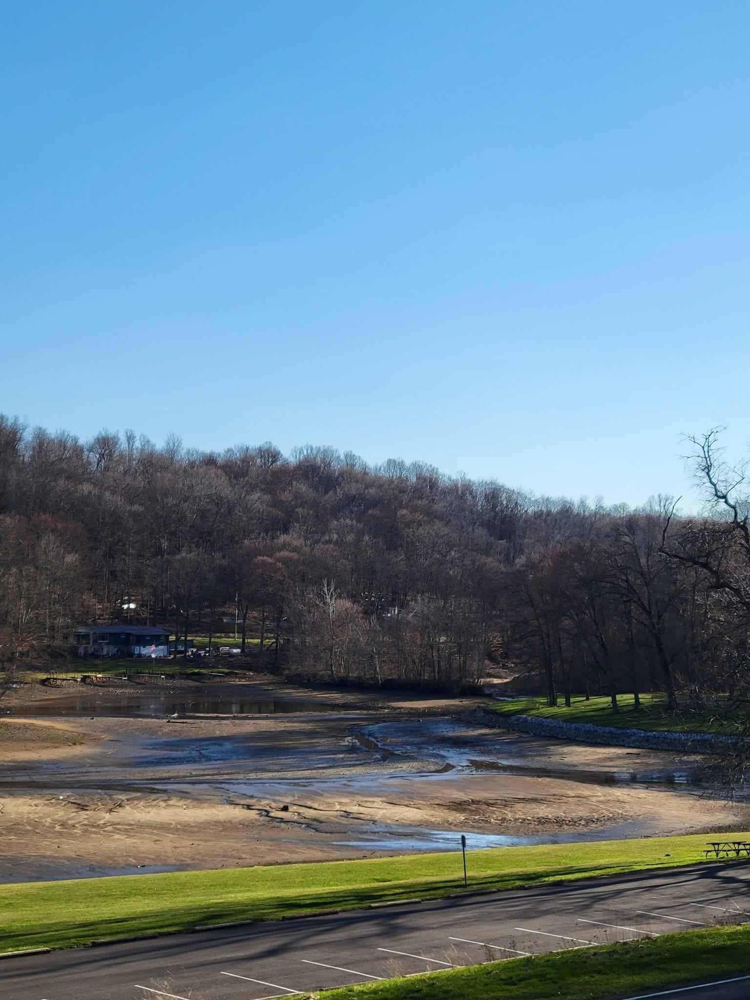 View of lake from front porch, March 2026