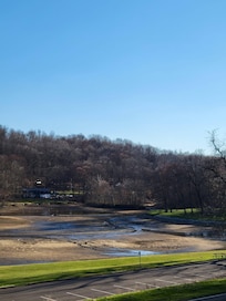 View of lake from front porch, March 2026