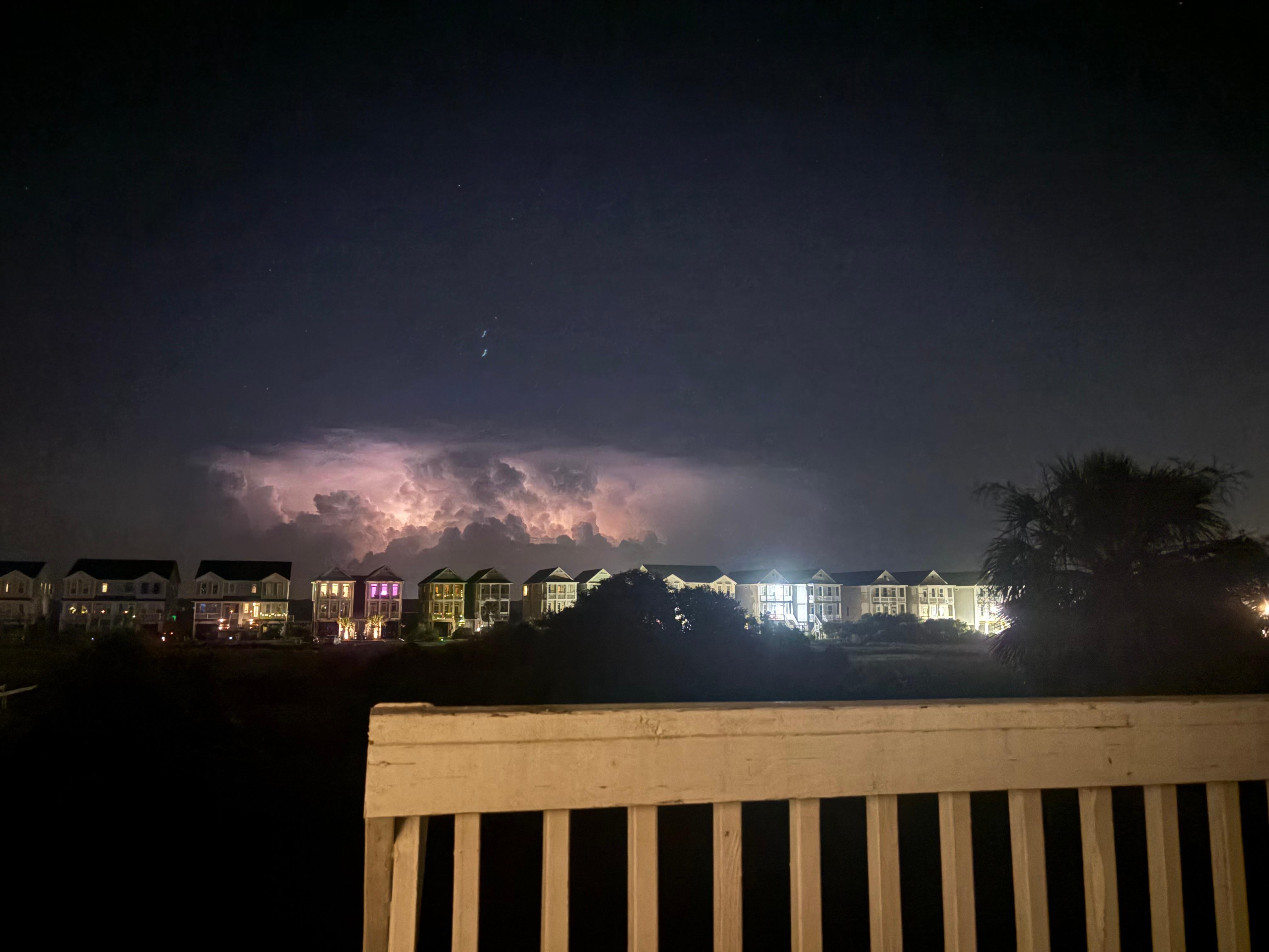 Watching a storm in the distance on the back deck! 