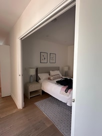 Bedroom along corridor to master bedroom