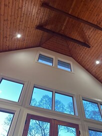 Very high cathedral ceilings with wood beam detail