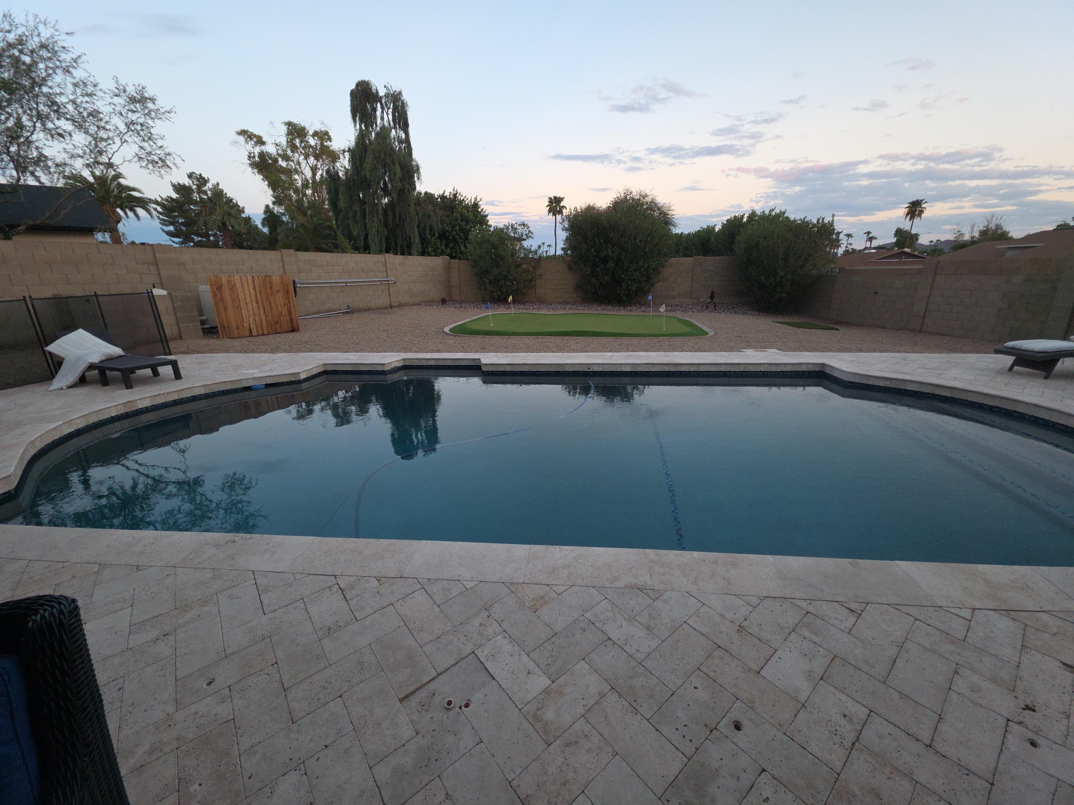 Huge pool and putting green