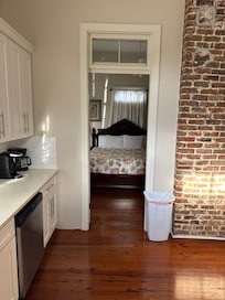 Kitchen looking into the first floor bedroom
