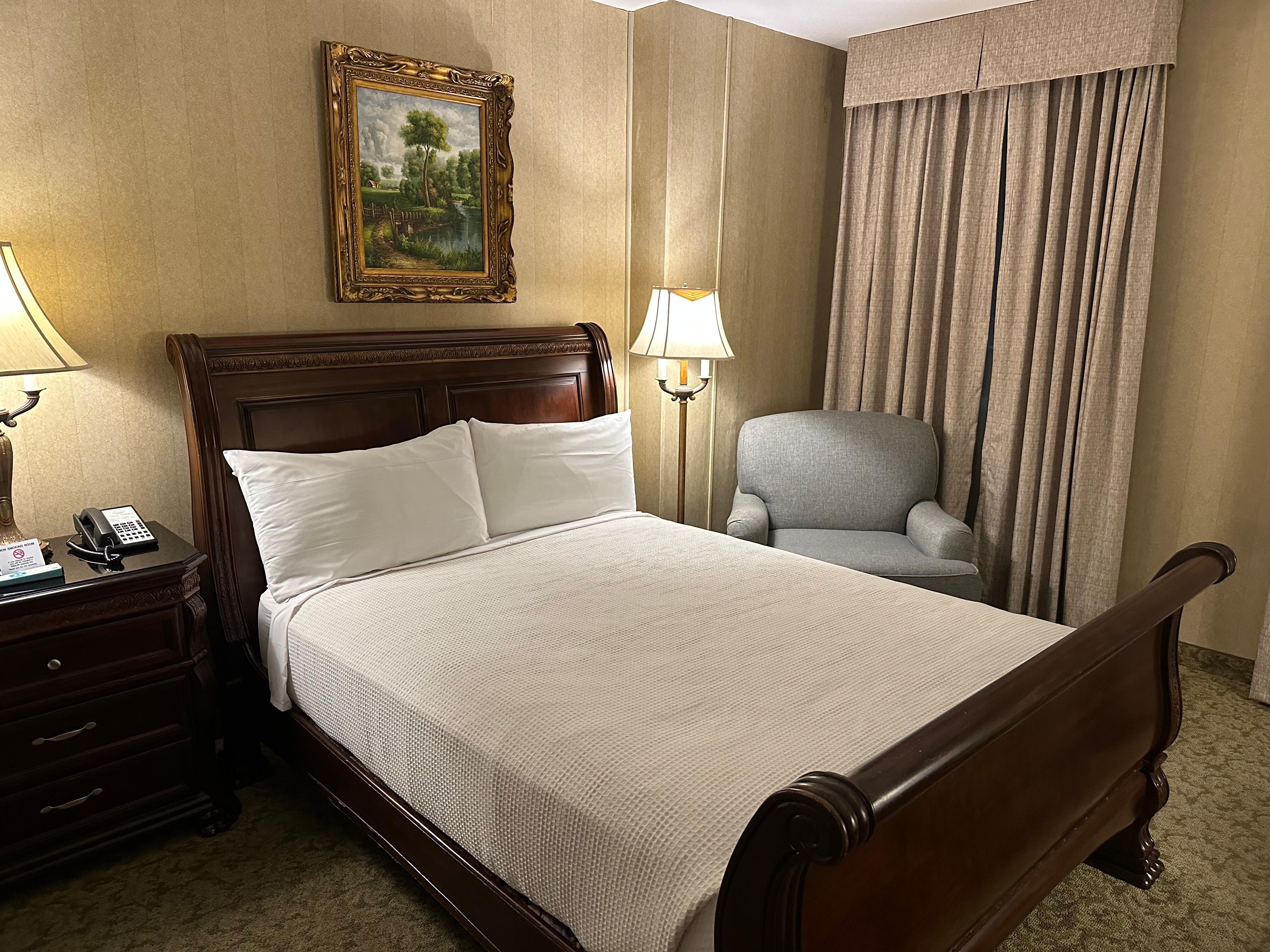 One of the queen beds in double queen bed room