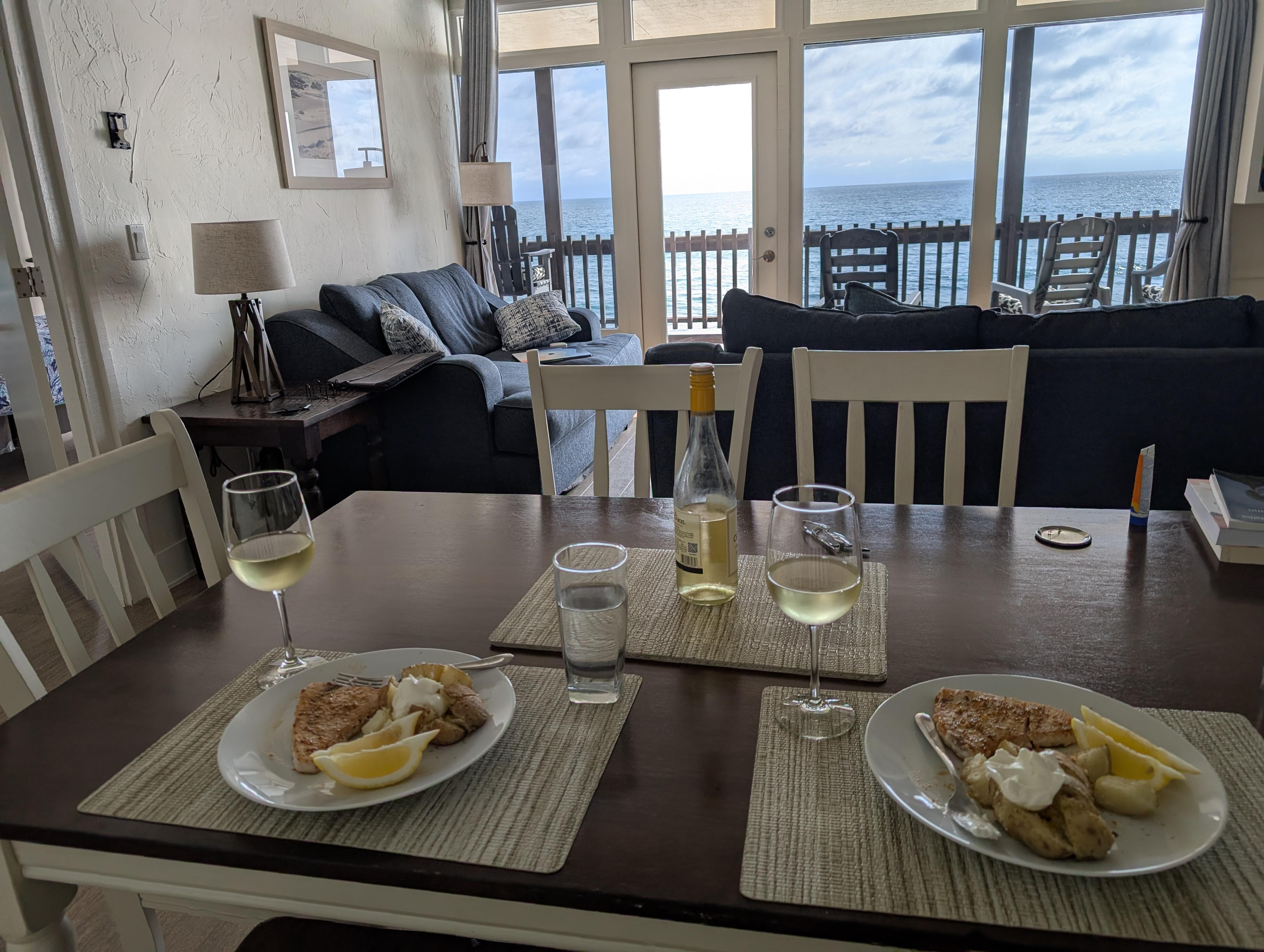 Enjoying dinner while watching the waves