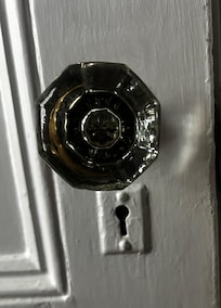 Love the antique doorknob and old keyhole