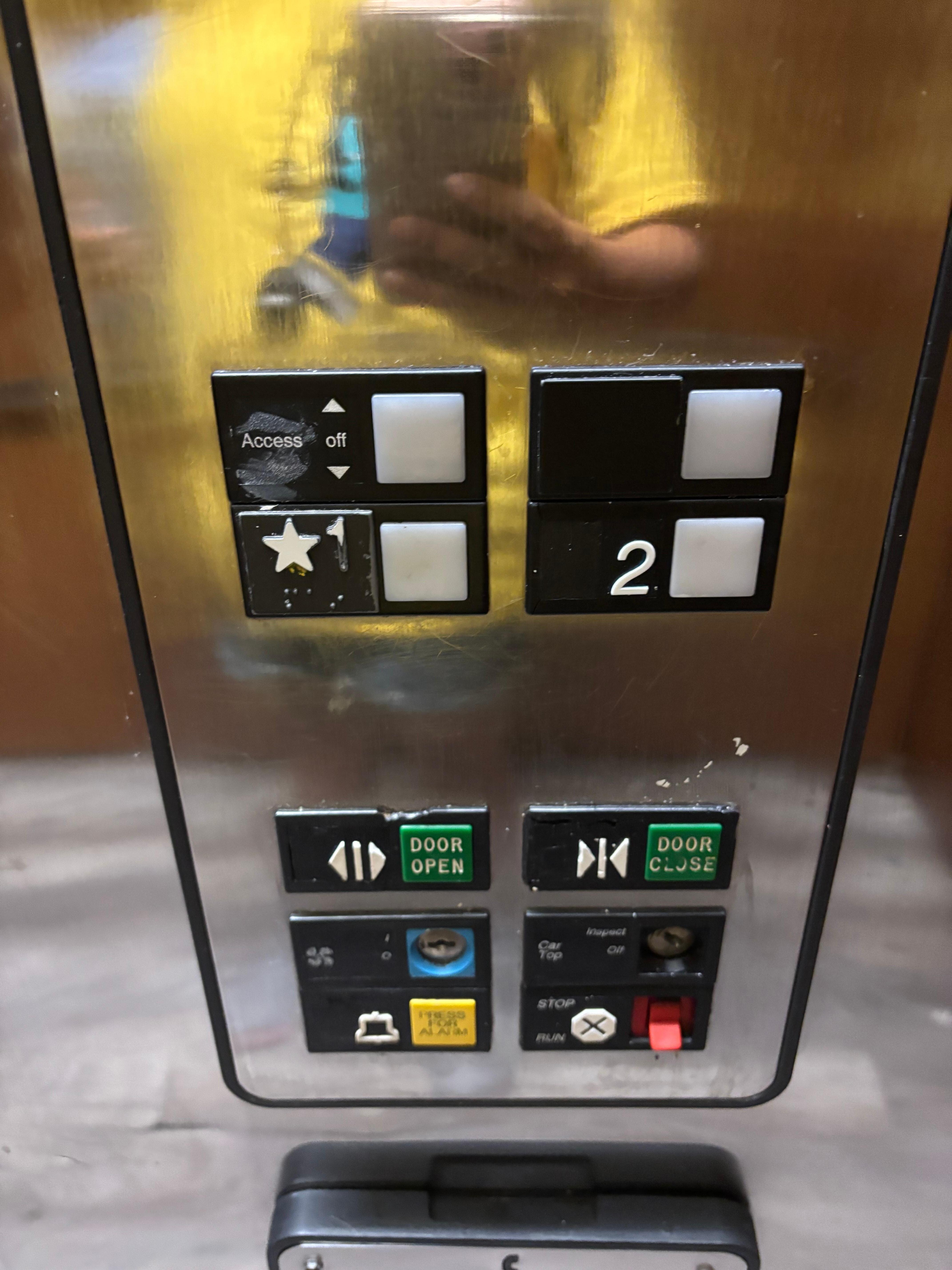 Third floor button is the “Access Off” with the 2 arrows.