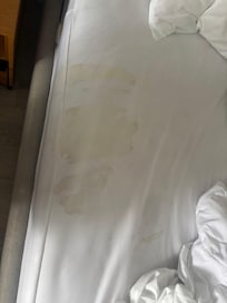 Stained dirty sheets.